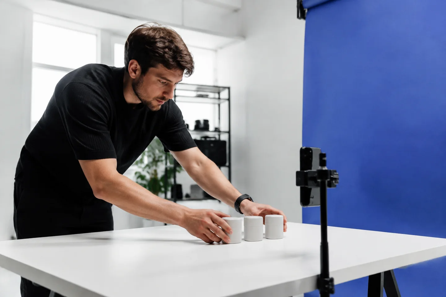A creator preparing a repeatable short-video product shoot.