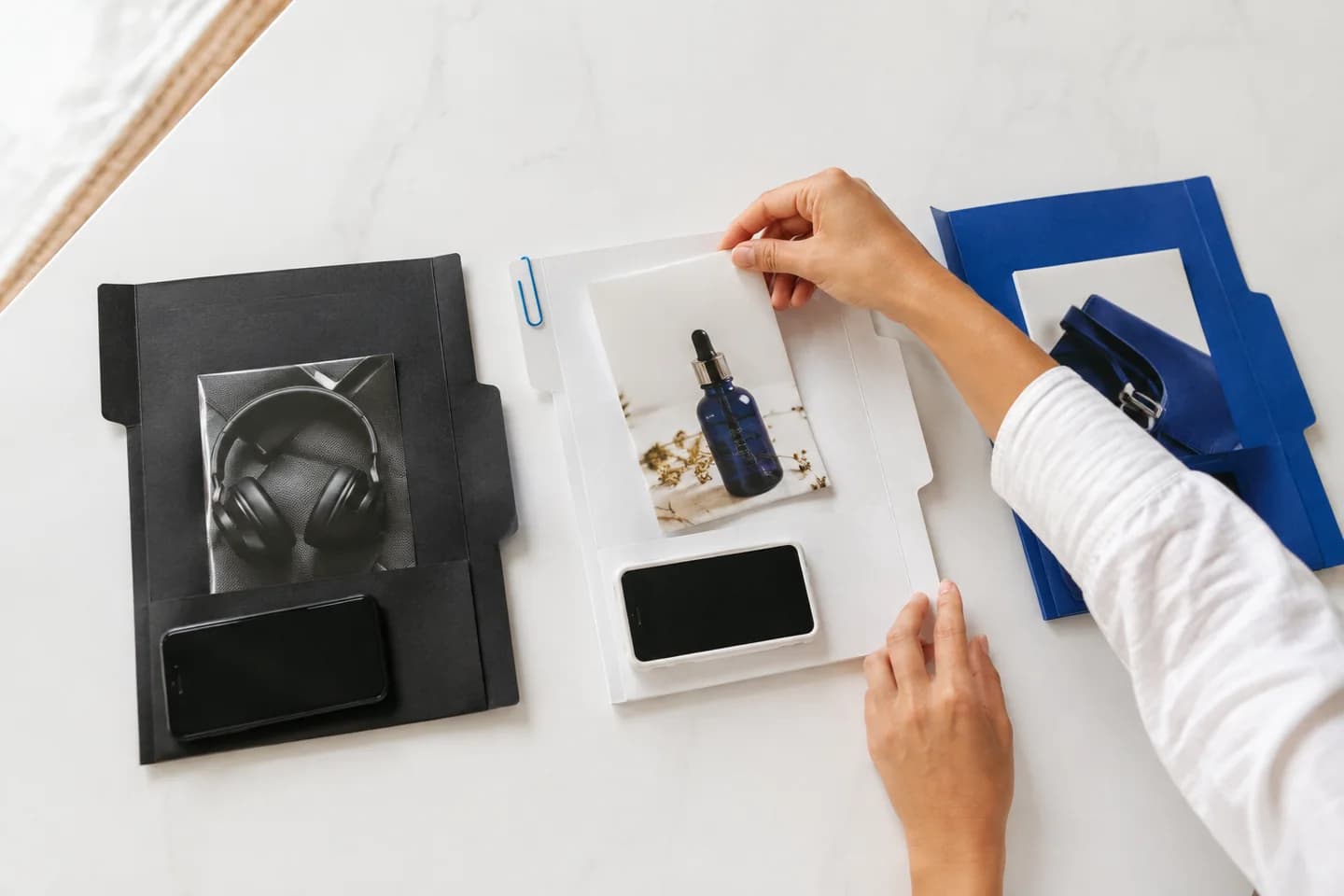 Separate product asset folders keep account destinations organized.