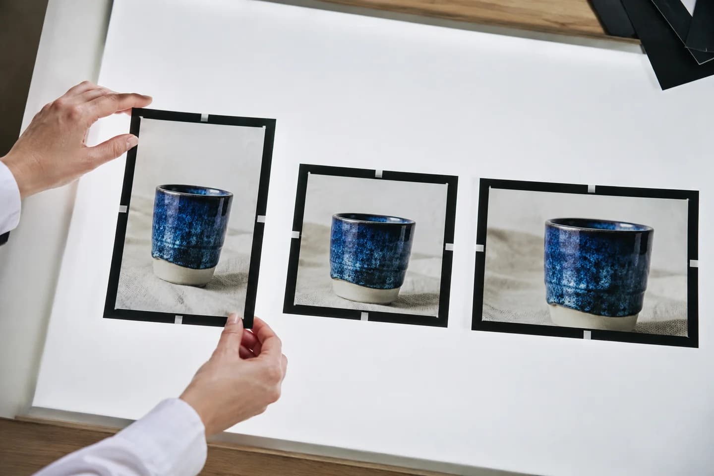 Hands compare three crops of the same product photograph.