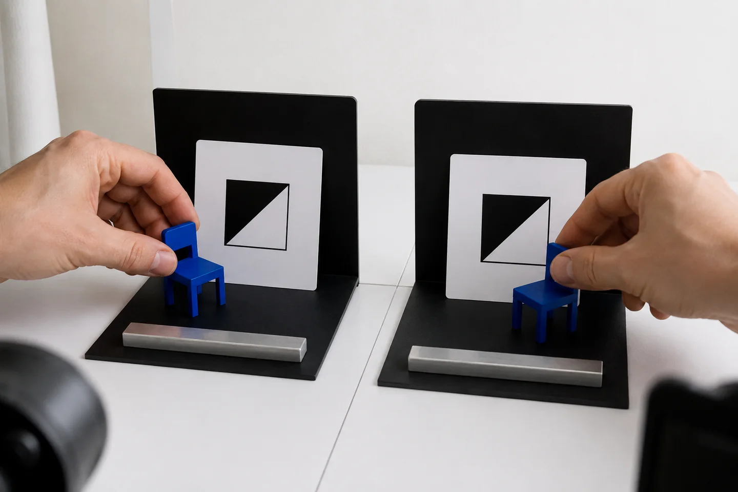 Matching miniature sets create repeatable video test inputs.