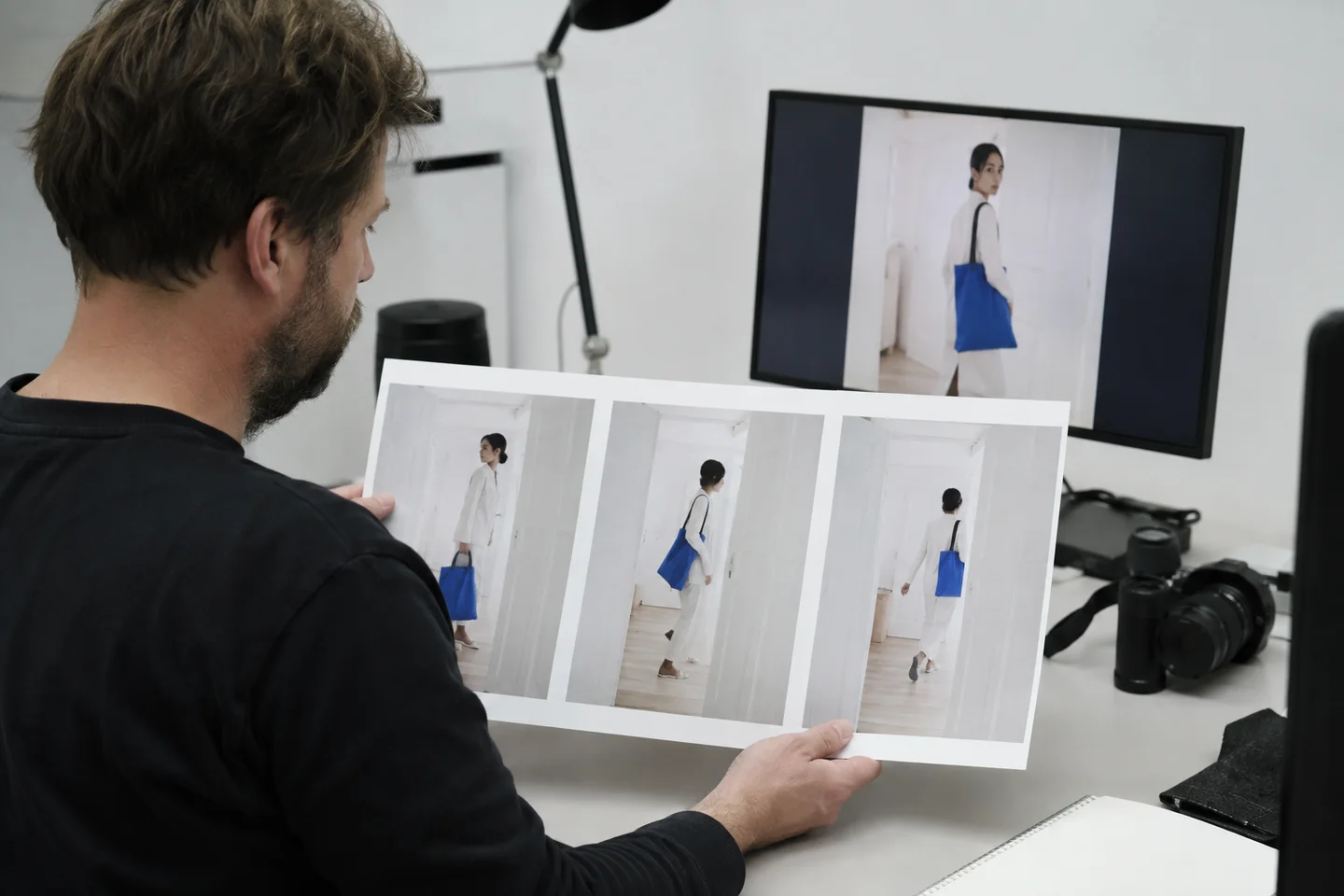 A filmmaker checking visual continuity across three moments of a scene.